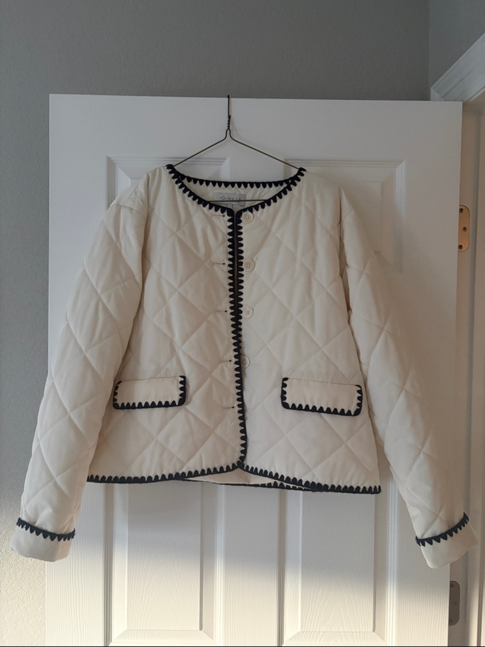Wayf Cream Quilted Jacket with Black Trim